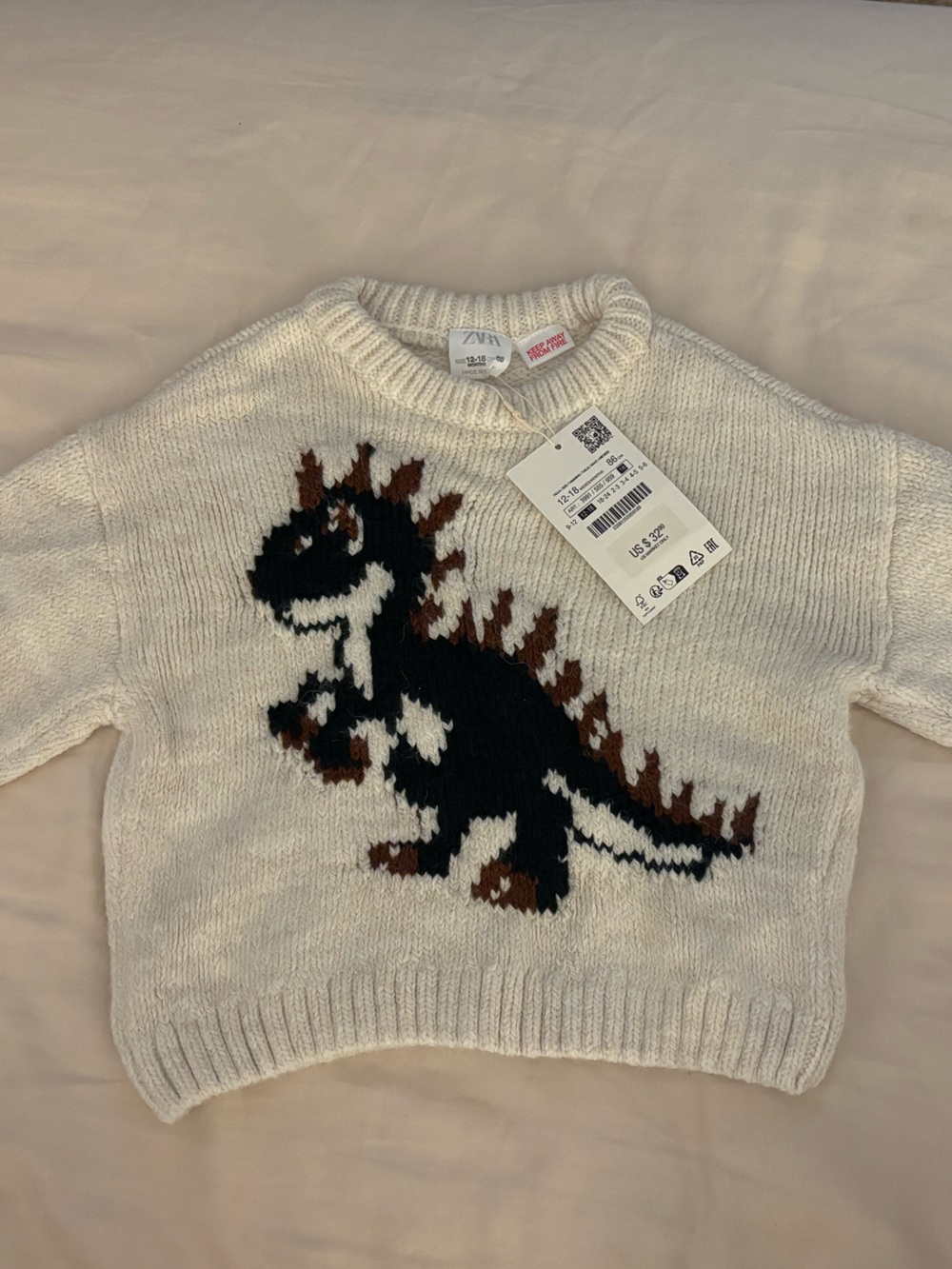 Zara Cream Sweater with Black and Brown Dragon Motif